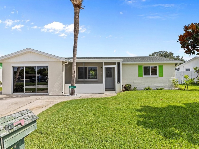 Discover this immaculately maintained waterfront gem, nestled on - Beach Home for sale in Port Richey, Florida on Beachhouse.com