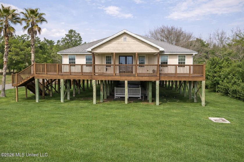 Perched to capture expansive water and beach views, this - Beach Home for sale in Long Beach, Mississippi on Beachhouse.com