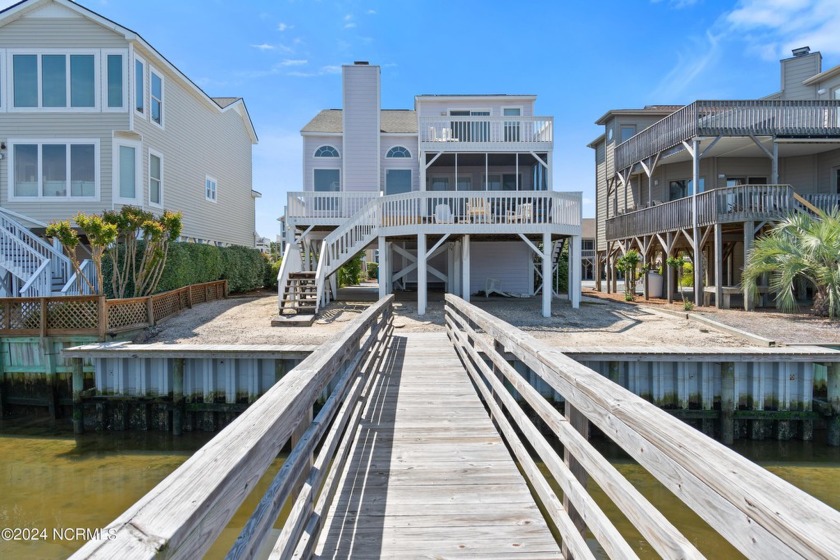 RARE OPPORTUNITY! Bayfront Beach House is perfectly located on a - Beach Home for sale in Sunset Beach, North Carolina on Beachhouse.com