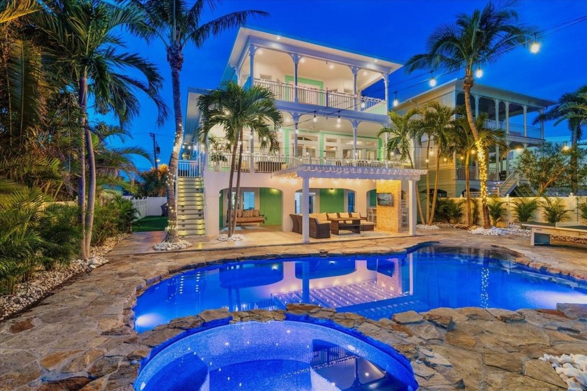 SURROUND YOURSELF IN PARADISE AT THIS ONE-OF-A-KIND, KEY WEST - Beach Home for sale in ST Pete Beach, Florida on Beachhouse.com