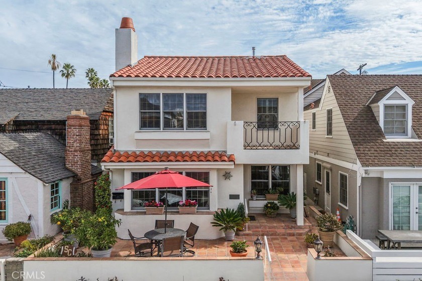 Situated on the coveted 100 block of Coral Avenue on Balboa - Beach Townhome/Townhouse for sale in Newport Beach, California on Beachhouse.com