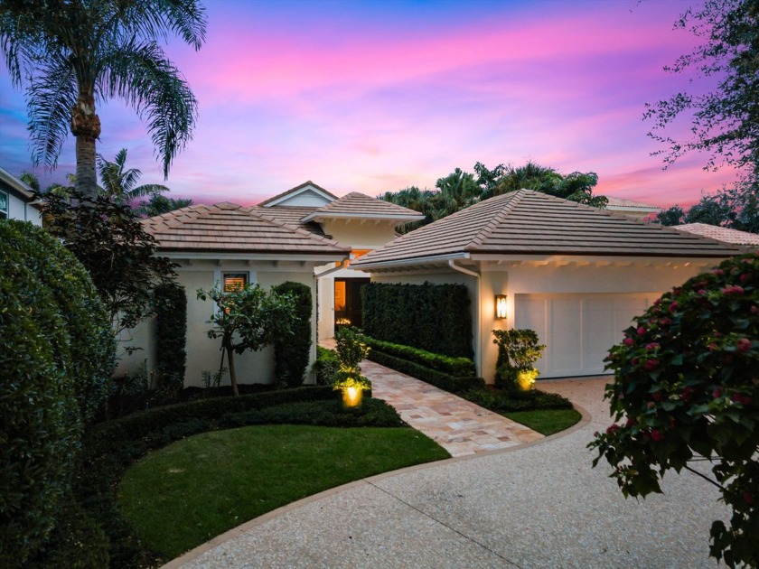 This exceptional 3-bedroom, 3.5-bath home situated on just under - Beach Home for sale in Jupiter, Florida on Beachhouse.com