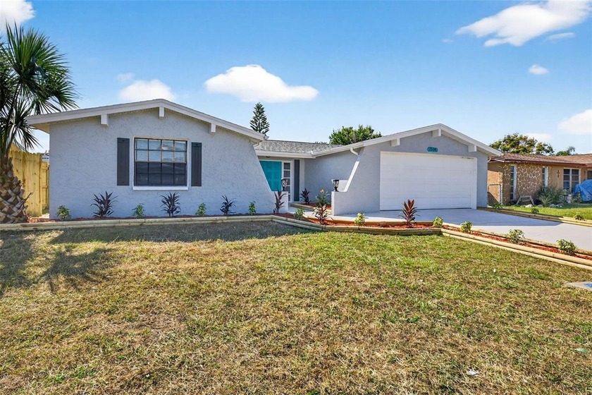 Get ready to fall in love this fully renovated home is one of - Beach Home for sale in Port Richey, Florida on Beachhouse.com