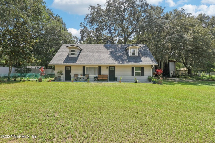 Nestled on a generous 1-acre lot, this home offers the perfect - Beach Home for sale in Yulee, Florida on Beachhouse.com