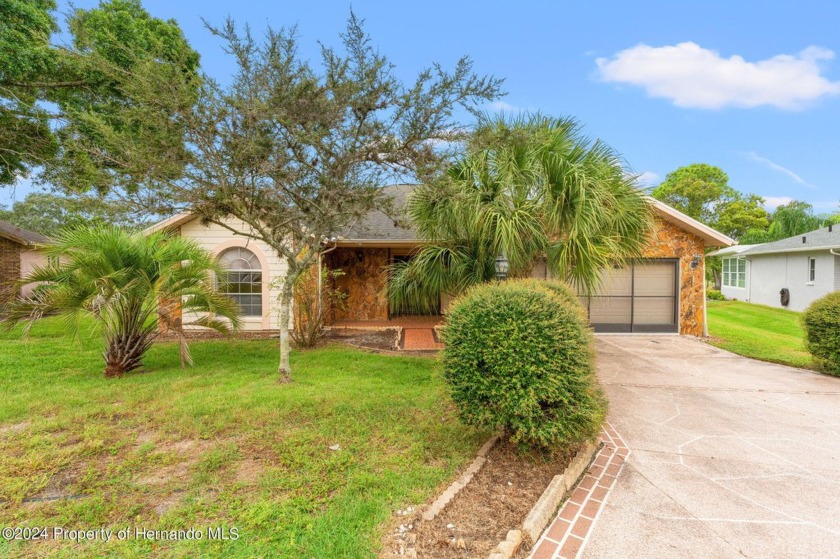 Charming 2-bedroom, 2-bath home located on a cul-de-sac in the - Beach Home for sale in Spring Hill, Florida on Beachhouse.com