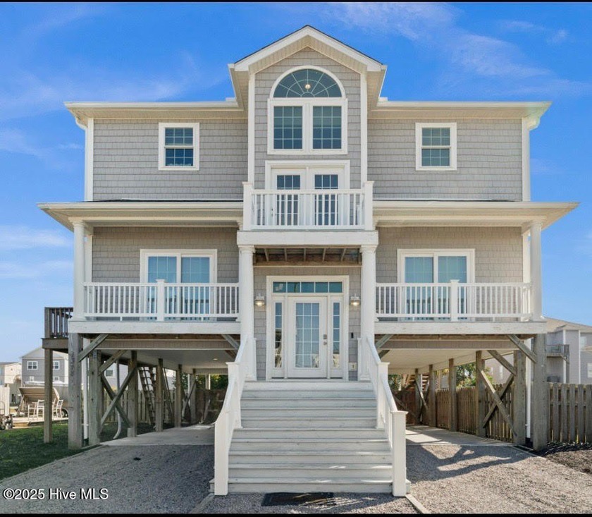 Welcome to your coastal retreat! This bright and inviting 5 - Beach Home for sale in Surf City, North Carolina on Beachhouse.com