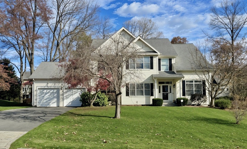 Discover modern comfort in this beautiful 4-bedroom Colonial set - Beach Home for sale in Milford, Connecticut on Beachhouse.com