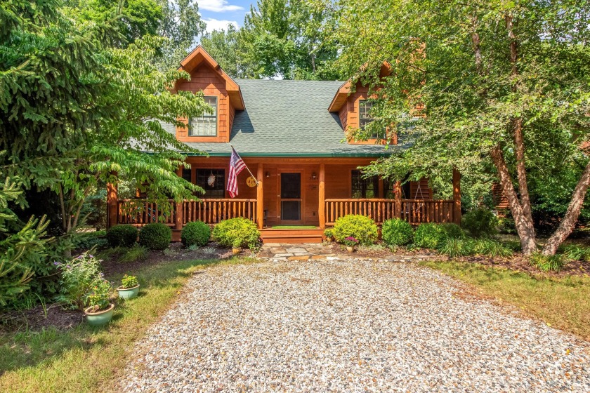 This unique Kingfisher Cove log home offers many custom features - Beach Home for sale in Saugatuck, Michigan on Beachhouse.com