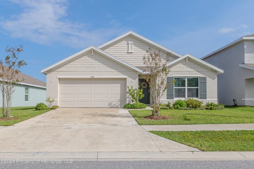 Built in 2022 and move-in ready, make this 4 bd, 2 ba, 2-car - Beach Home for sale in Spring Hill, Florida on Beachhouse.com