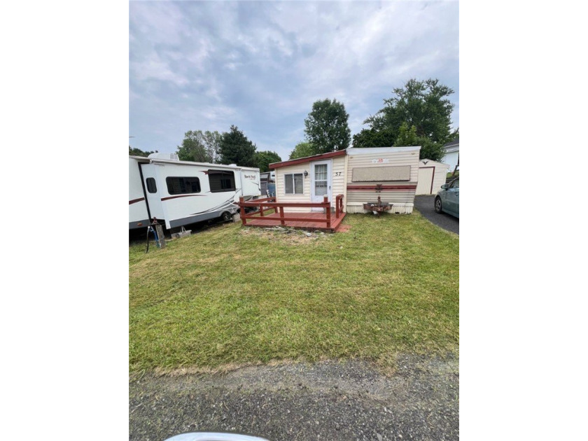 Swimming pool - open daily in July and August, with a certified - Beach Home for sale in Sodus Point, New York on Beachhouse.com