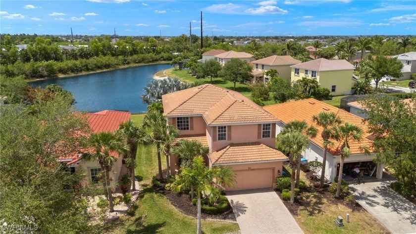 Welcome to this stunning two-story lakefront home, nestled - Beach Home for sale in Cape Coral, Florida on Beachhouse.com