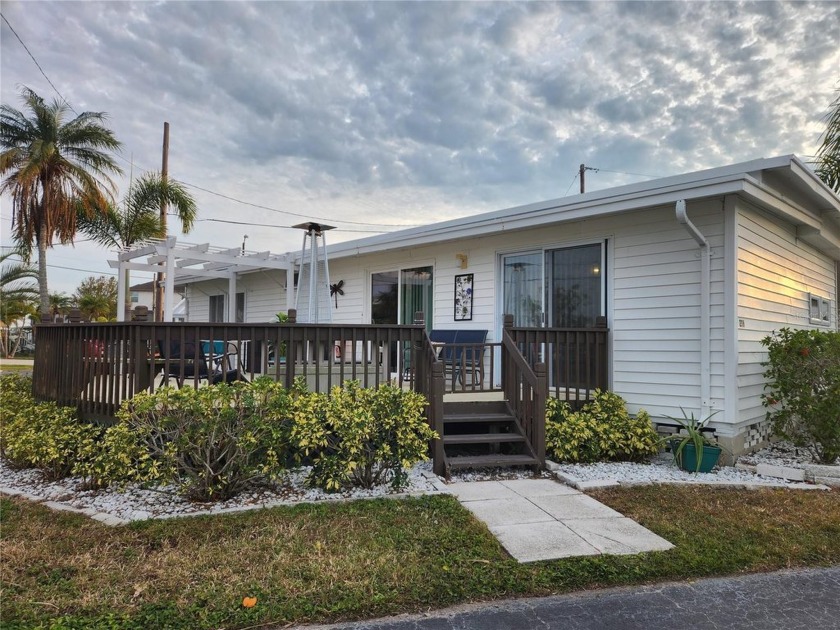 This 2 bed 2 bath home has beautiful waterfront views.  The home - Beach Home for sale in Seminole, Florida on Beachhouse.com