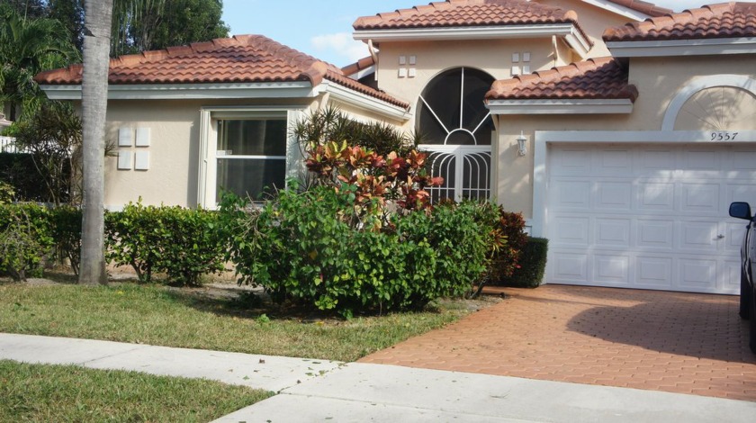 This stunning home offers an array of exceptional features - Beach Home for sale in Boynton Beach, Florida on Beachhouse.com