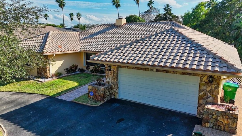 Spacious 4BR/2.5BA ranch home with 2-car garage in desirable - Beach Home for sale in Coral Springs, Florida on Beachhouse.com