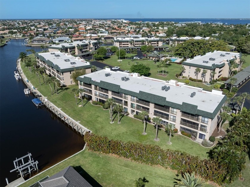 This turnkey-furnished, second-floor end-unit home is ideal for - Beach Condo for sale in Punta Gorda, Florida on Beachhouse.com