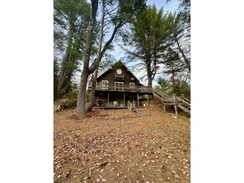 Lovely cabin on ~330' of the Tahquamenon River! This seasonal - Beach Home for sale in Mcmillan, Michigan on Beachhouse.com