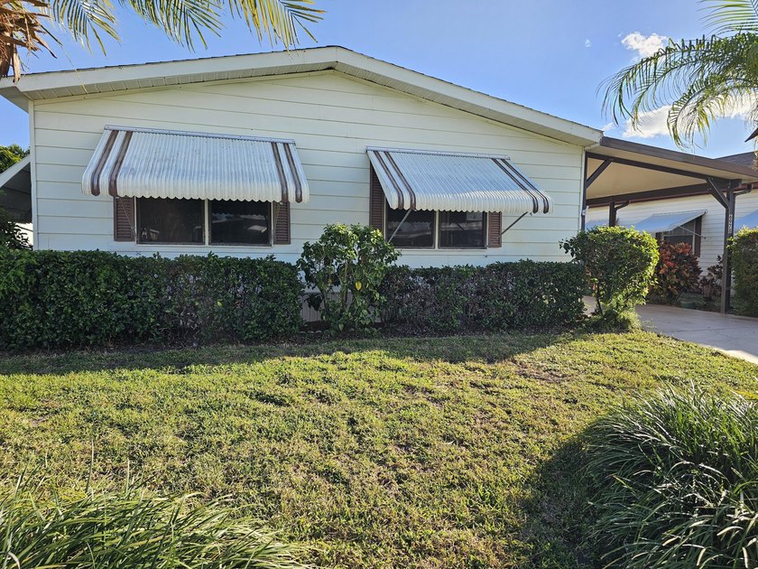 Own the land! This move-in ready 2-bedroom, 2 bath home is - Beach Home for sale in Hobe Sound, Florida on Beachhouse.com