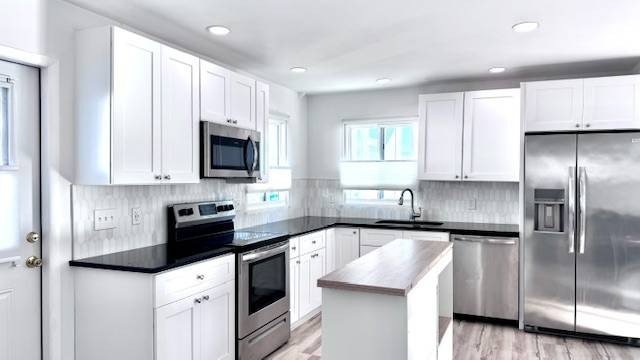 Located in the 55+ Premier Gated Waterfront Community, Old - Beach Home for sale in North Fort Myers, Florida on Beachhouse.com