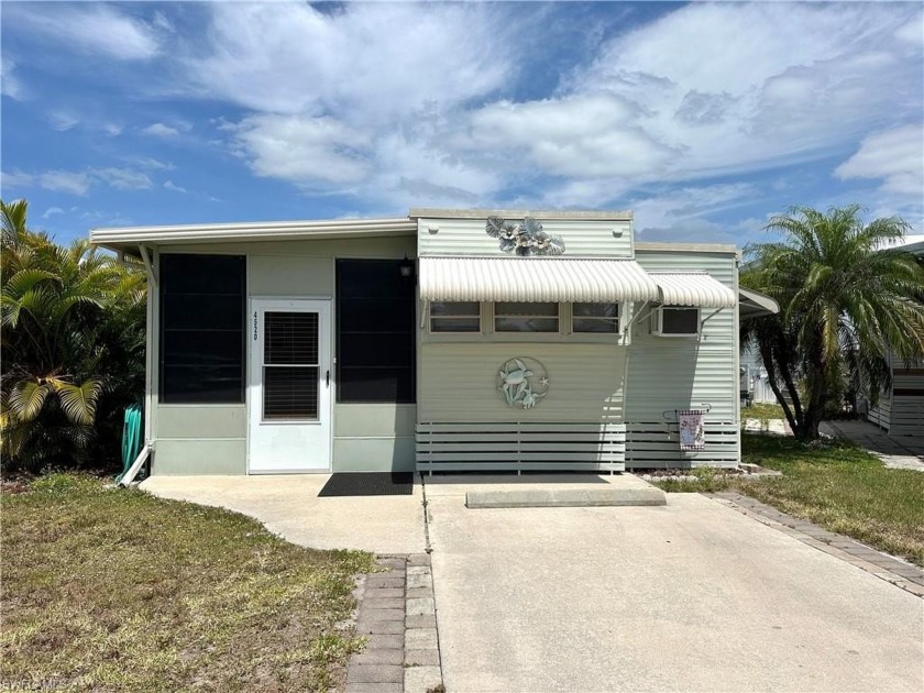Welcome to this charming 1983 mobile home cottage, where - Beach Home for sale in Estero, Florida on Beachhouse.com