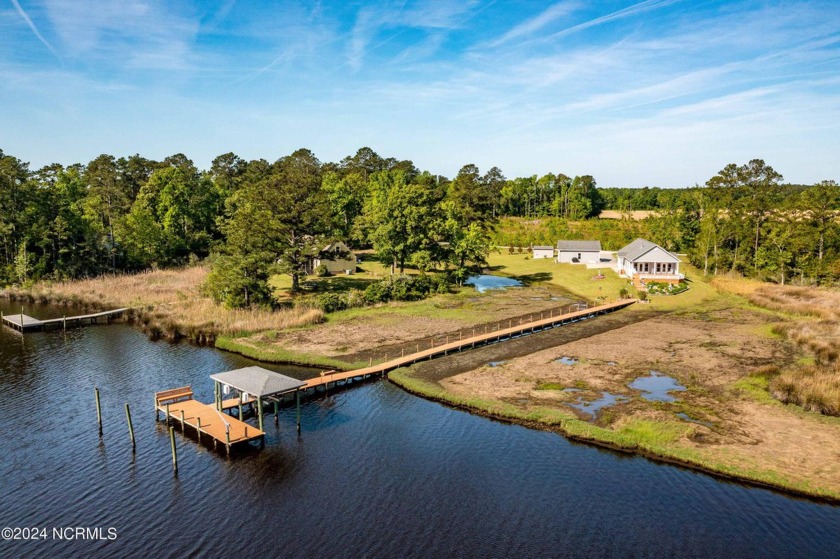 Embrace the tranquil lifestyle along Dawson Creek in this - Beach Home for sale in Arapahoe, North Carolina on Beachhouse.com