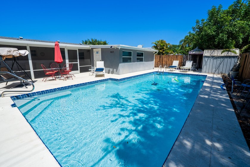 Absolutely stunning well kept 4 bedroom 2 bath room home located - Beach Home for sale in Palm Beach Gardens, Florida on Beachhouse.com