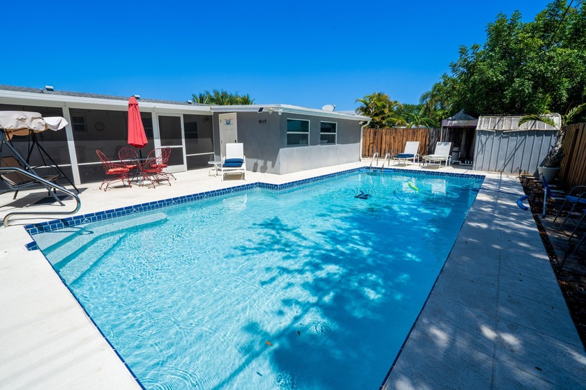 Absolutely stunning well kept 4 bedroom 2 bath room home located - Beach Home for sale in Palm Beach Gardens, Florida on Beachhouse.com