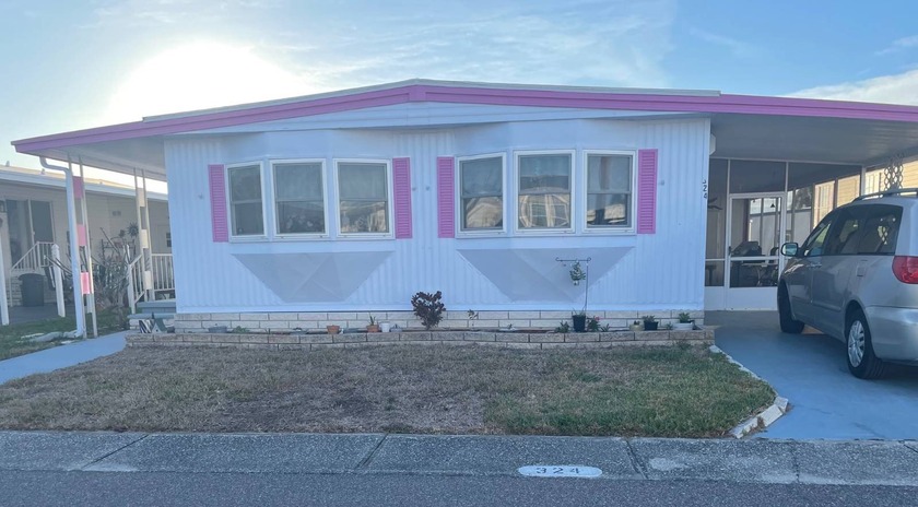 Comfort and style await in this charming 2-bedroom, 2-bath home - Beach Home for sale in Clearwater, Florida on Beachhouse.com