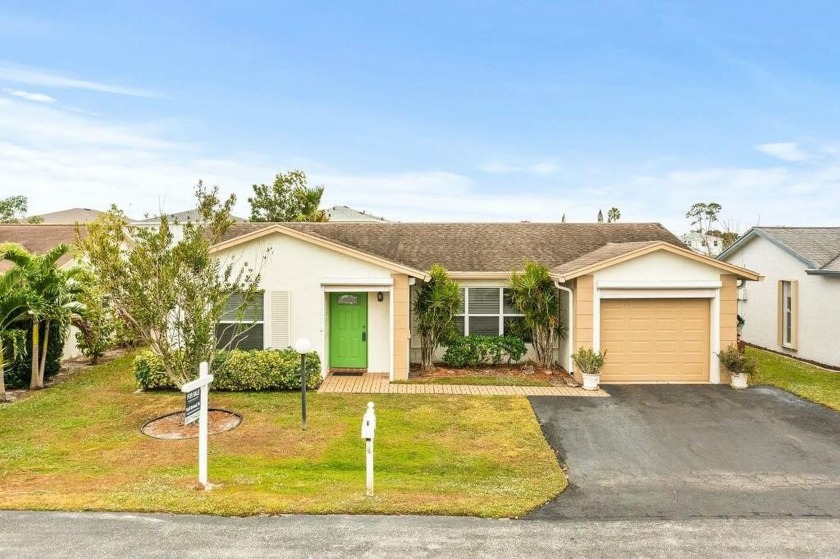 Welcome to this warm & wonderful single story home. Its has been - Beach Home for sale in Lake Worth, Florida on Beachhouse.com