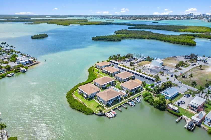 Experience the essence of coastal living in this beautifully - Beach Condo for sale in Naples, Florida on Beachhouse.com