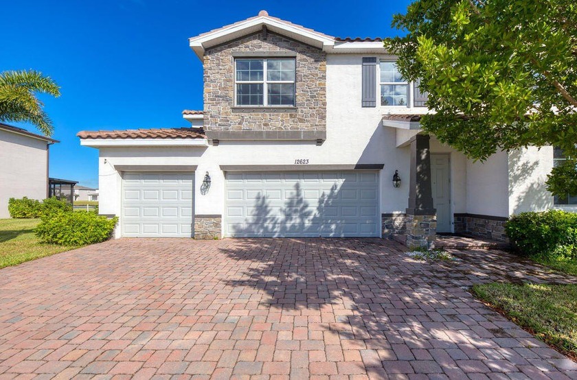 Desirable Helena model in gated, lakefront Copper Creek - - Beach Home for sale in Port Saint Lucie, Florida on Beachhouse.com