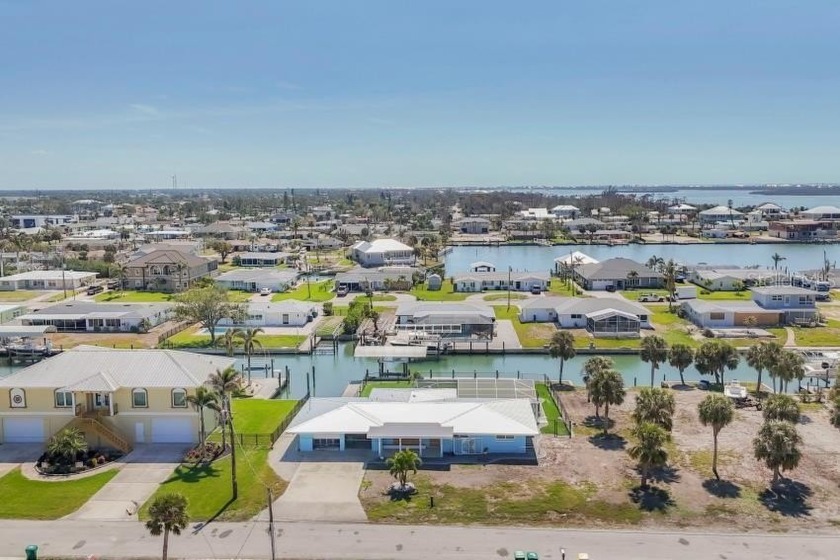 This three bedroom, two bath waterfront home offers the perfect - Beach Home for sale in Englewood, Florida on Beachhouse.com
