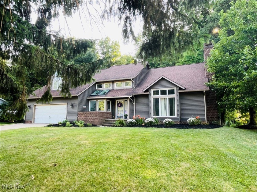 Welcome home to the alluring architecture found in this - Beach Home for sale in Madison, Ohio on Beachhouse.com