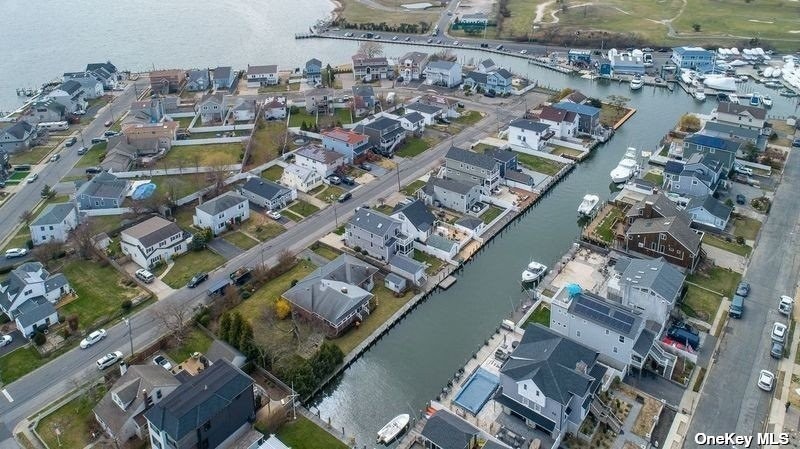 Updated raised colonial home on a 60-foot-wide canal right off - Beach Home for sale in Babylon, New York on Beachhouse.com