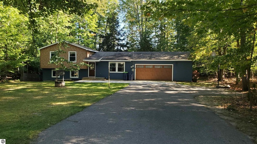 This is an extremely well maintained qual level home on Long - Beach Home for sale in Traverse City, Michigan on Beachhouse.com