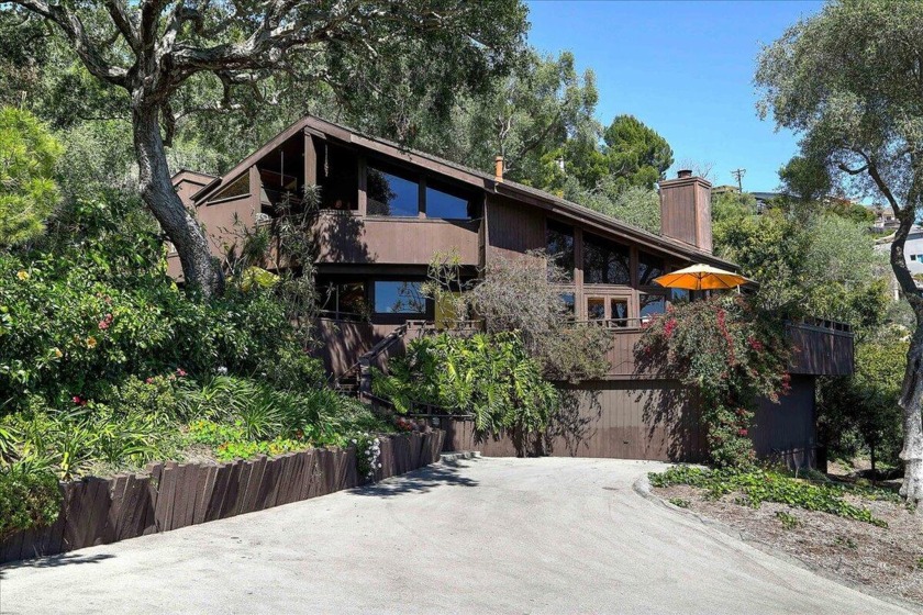Off the street, on a private drive, and on a large lot, this - Beach Home for sale in Santa Barbara, California on Beachhouse.com