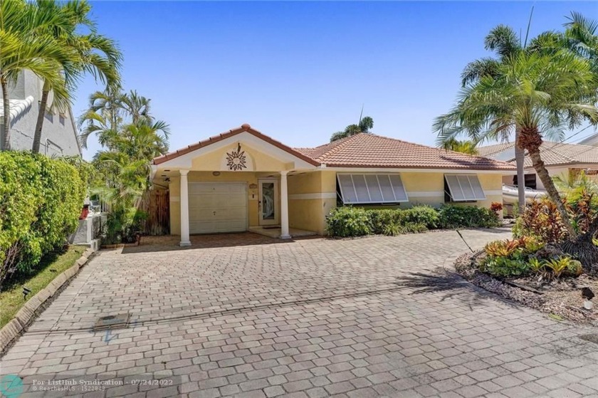 WOW! FABULOUS 3 BEDROOM 2 BATH WATERFRONT POOL HOME WITH 60FT OF - Beach Home for sale in Pompano Beach, Florida on Beachhouse.com