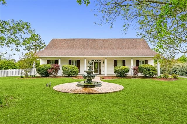This beautiful Acadian home is situated on 10 sprawling acres in - Beach Home for sale in Waggaman, Louisiana on Beachhouse.com