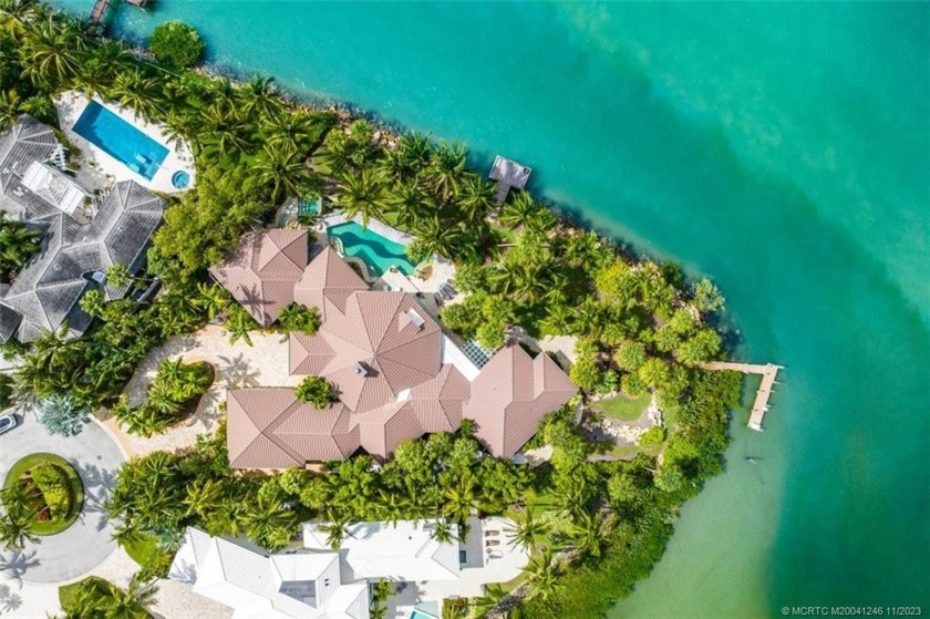 This spectacular waterfront estate is located on nearly an acre - Beach Home for sale in Stuart, Florida on Beachhouse.com