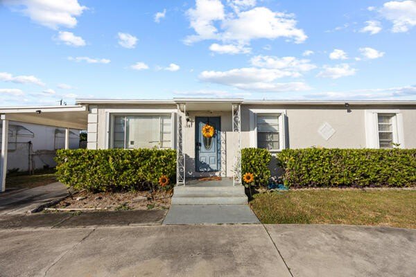 Renovated single family home with a newer roof and a newer AC - Beach Home for sale in Riviera Beach, Florida on Beachhouse.com