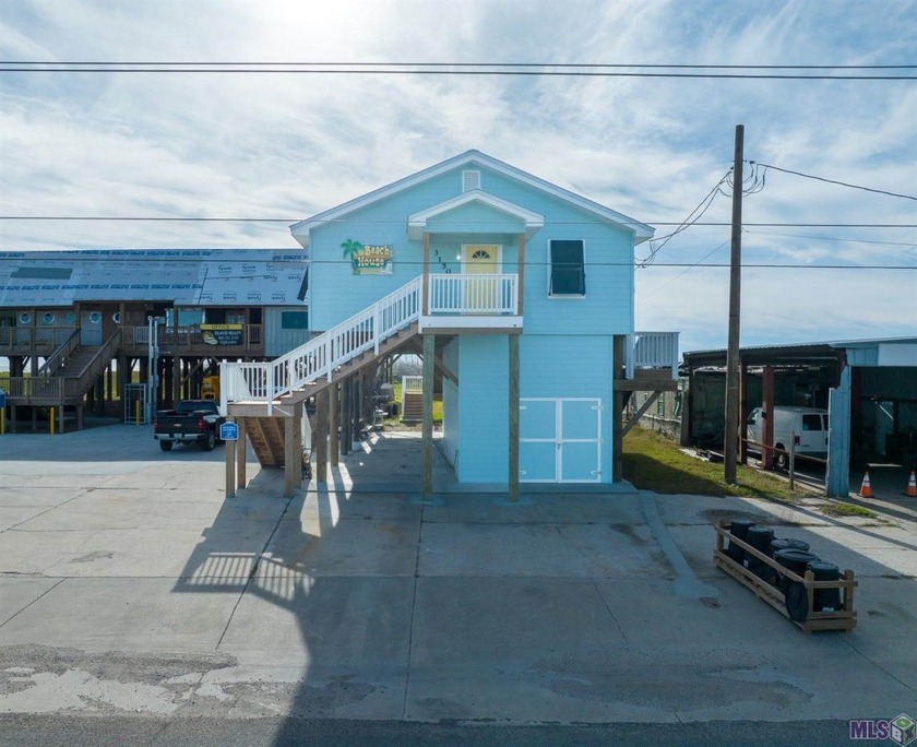 Step into your own slice of paradise with this exquisite - Beach Home for sale in Grand Isle, Louisiana on Beachhouse.com