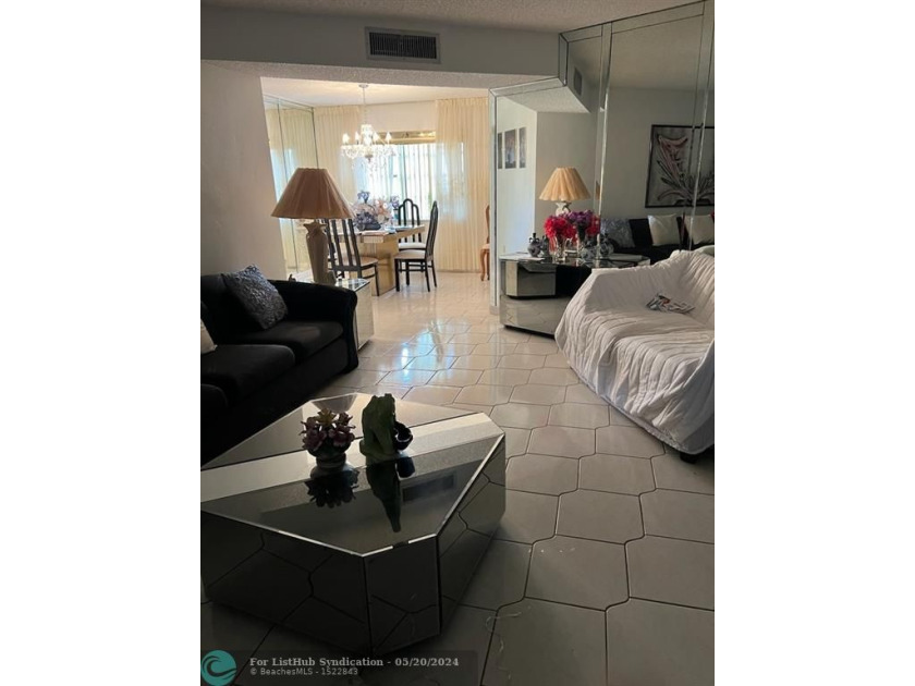 A lovely and spacious 2 bedroom 2 bathroom condominium with a - Beach Condo for sale in Lauderdale Lakes, Florida on Beachhouse.com
