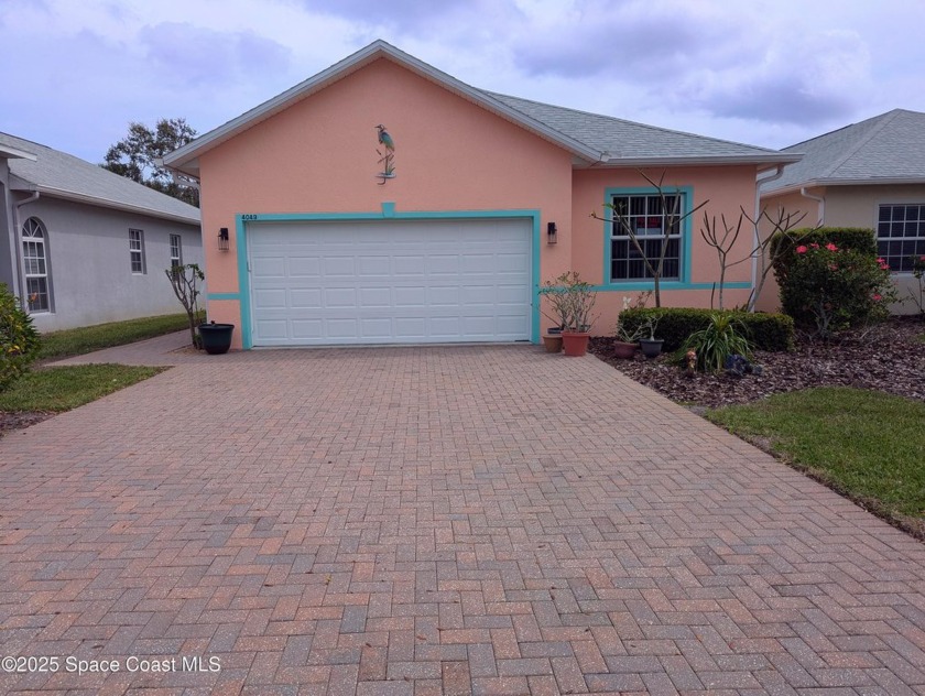 Beautiful single family home in the highly sought after gated - Beach Home for sale in Merritt Island, Florida on Beachhouse.com