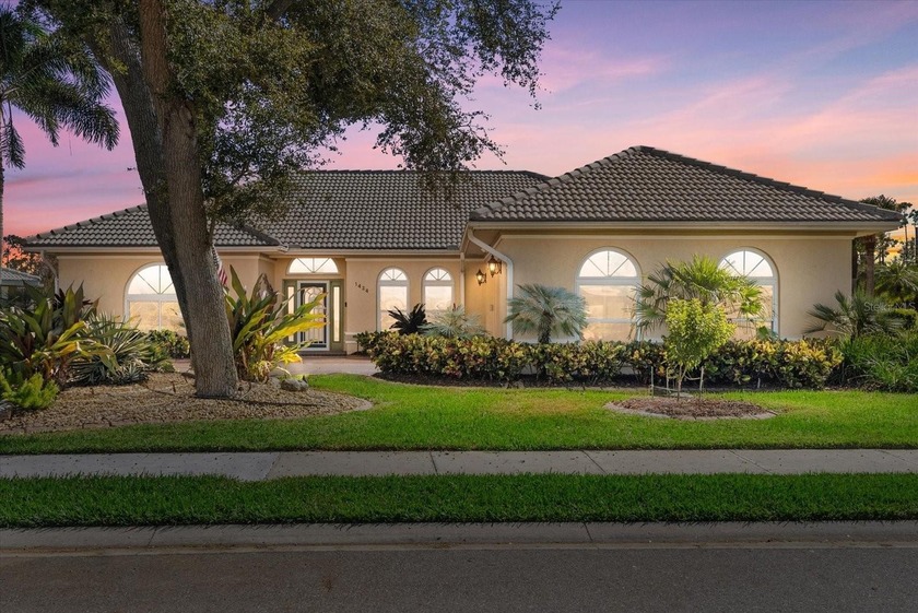 This elegant 3-bedroom, 2.5-bath home with an oversized 2.5-car - Beach Home for sale in Venice, Florida on Beachhouse.com