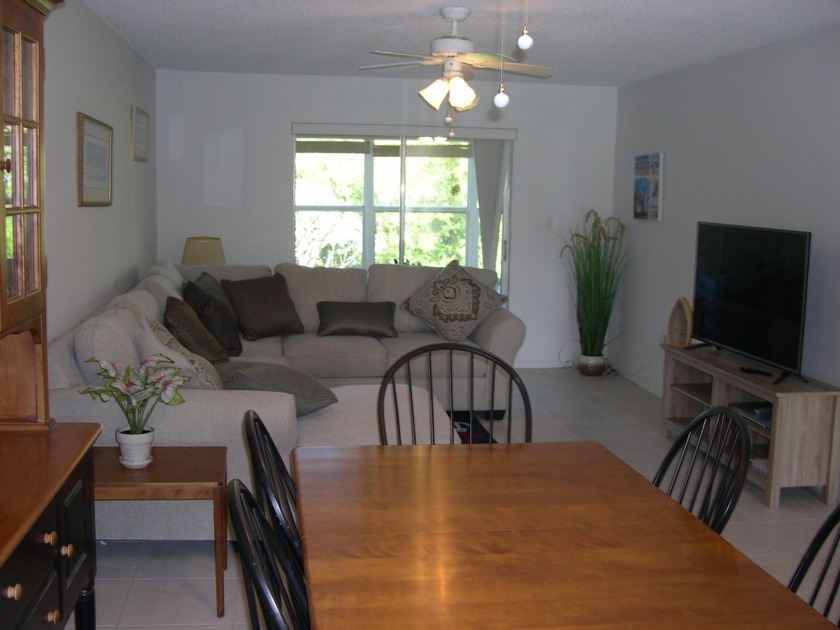 Air-conditioned balcony (Florida Room) serves as a second - Beach Condo for sale in Fort Pierce, Florida on Beachhouse.com