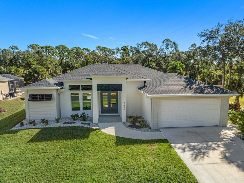 Experience EXCEPTIONAL quality and craftsmanship in this new - Beach Home for sale in Port Charlotte, Florida on Beachhouse.com