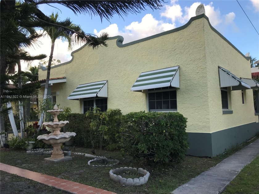 Seize this incredible opportunity to own a versatile - Beach Townhome/Townhouse for sale in Miami, Florida on Beachhouse.com