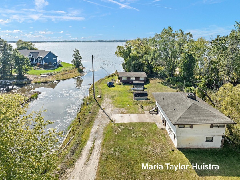 Rare opportunity to own a remarkable waterfront property with - Beach Home for sale in Muskegon, Michigan on Beachhouse.com