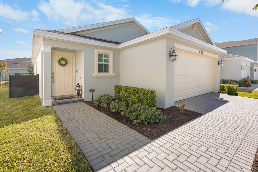 This new single-story home features a smart layout designed for - Beach Home for sale in Port Saint Lucie, Florida on Beachhouse.com