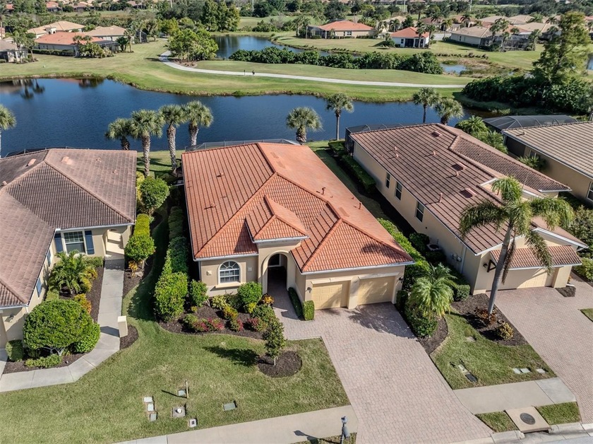 Luxurious country club living with premium water and golf views - Beach Home for sale in Venice, Florida on Beachhouse.com
