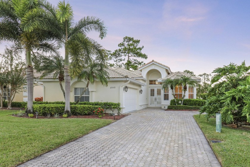 ENJOY RELAXING LAKE & GOLF VIEWS FROM YOUR VERY OWN SCREENED - Beach Home for sale in Port Saint Lucie, Florida on Beachhouse.com